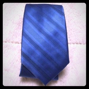 Solid blue striped tie
